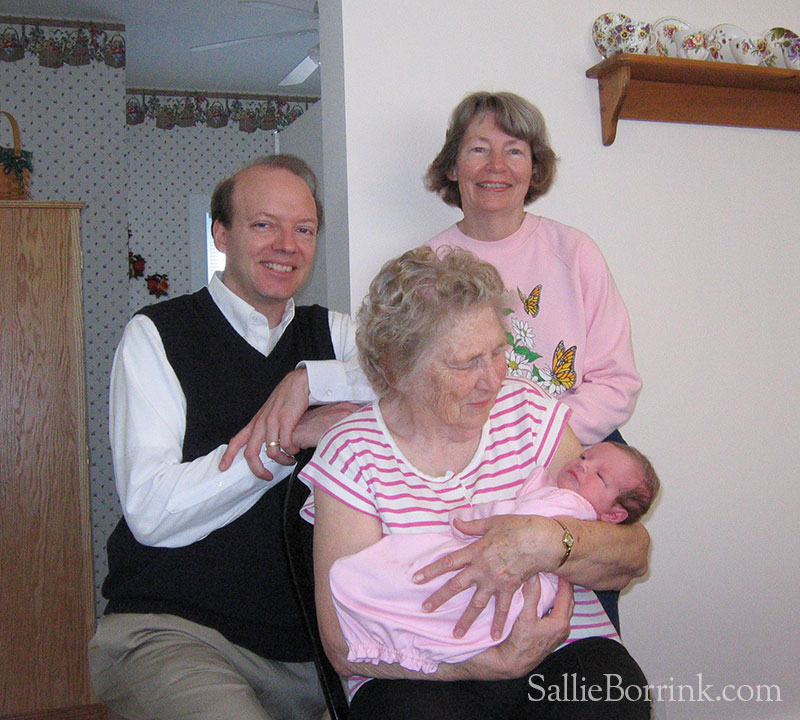 Four generations of the Baareman family, featuring baby Caroline, her father David, grandmother Joann, and great-grandmother Johanna.