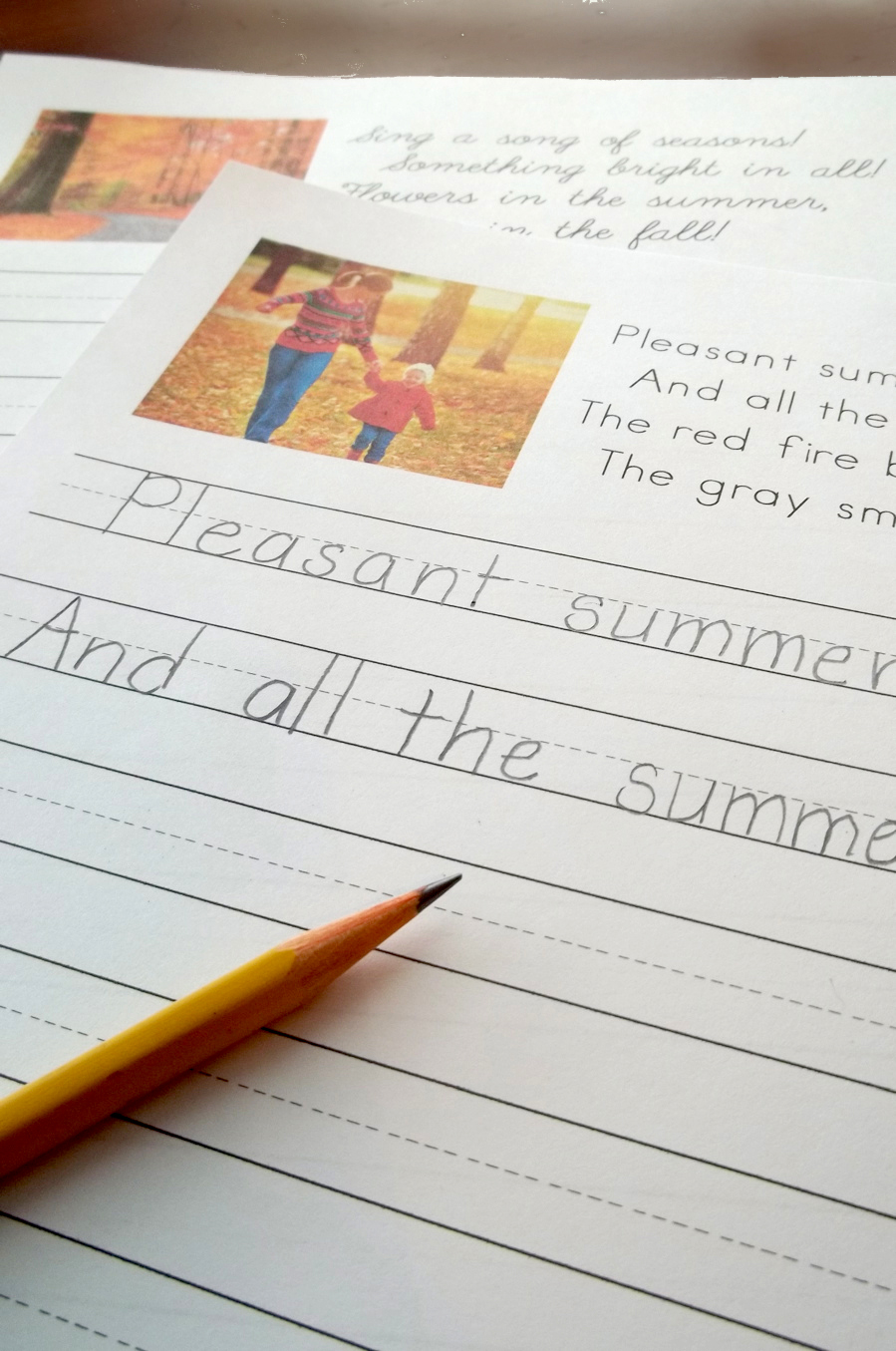 Copywork pages of Autumn Fires poem and pencil
