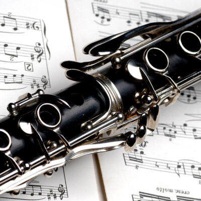 Clarinet laying on piece of sheet music