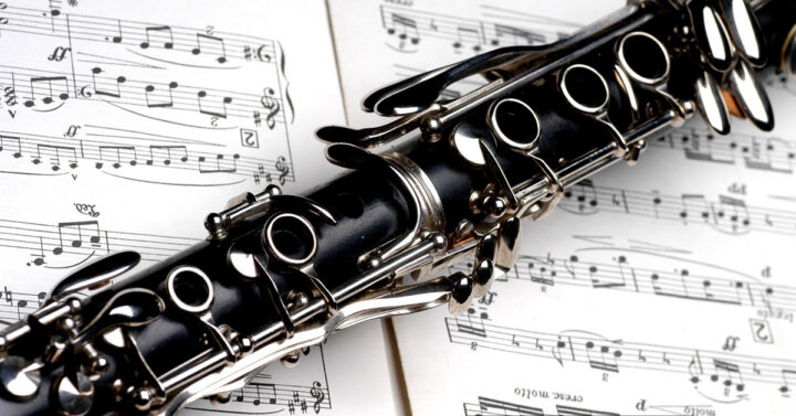 Clarinet laying on piece of sheet music