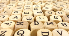 Wooden cubers with black capital letters