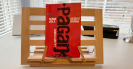 Book Pagan Christianity on a wooden book holder in a home
