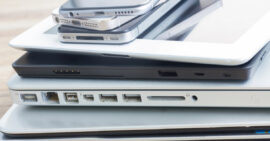 Pile of phones, tablets, and laptops