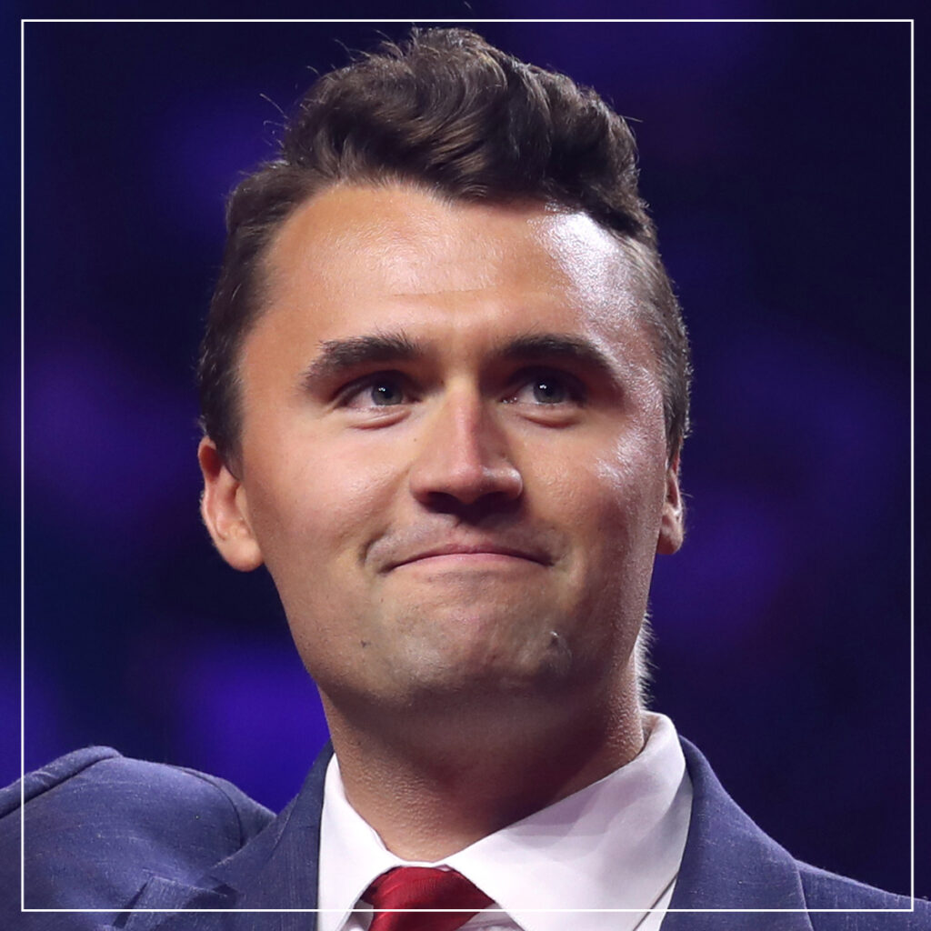 Head pictures of Charlie Kirk in coat and red tie