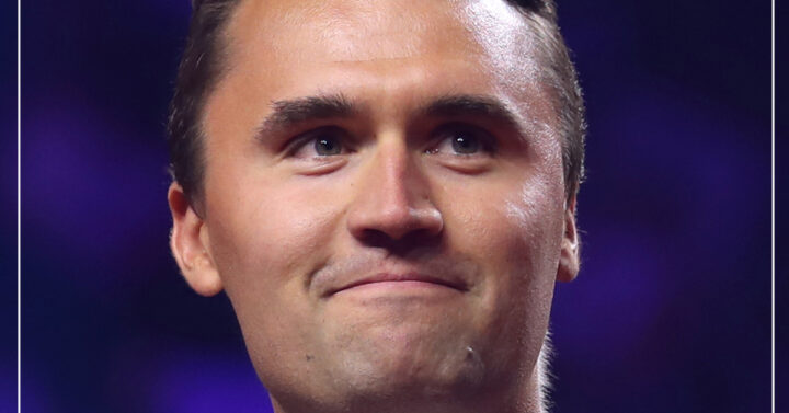 Head pictures of Charlie Kirk in coat and red tie