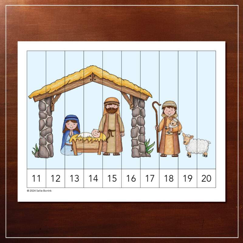 Manger scene with Mary, Joseph, Jesus, shepherd, and sheep