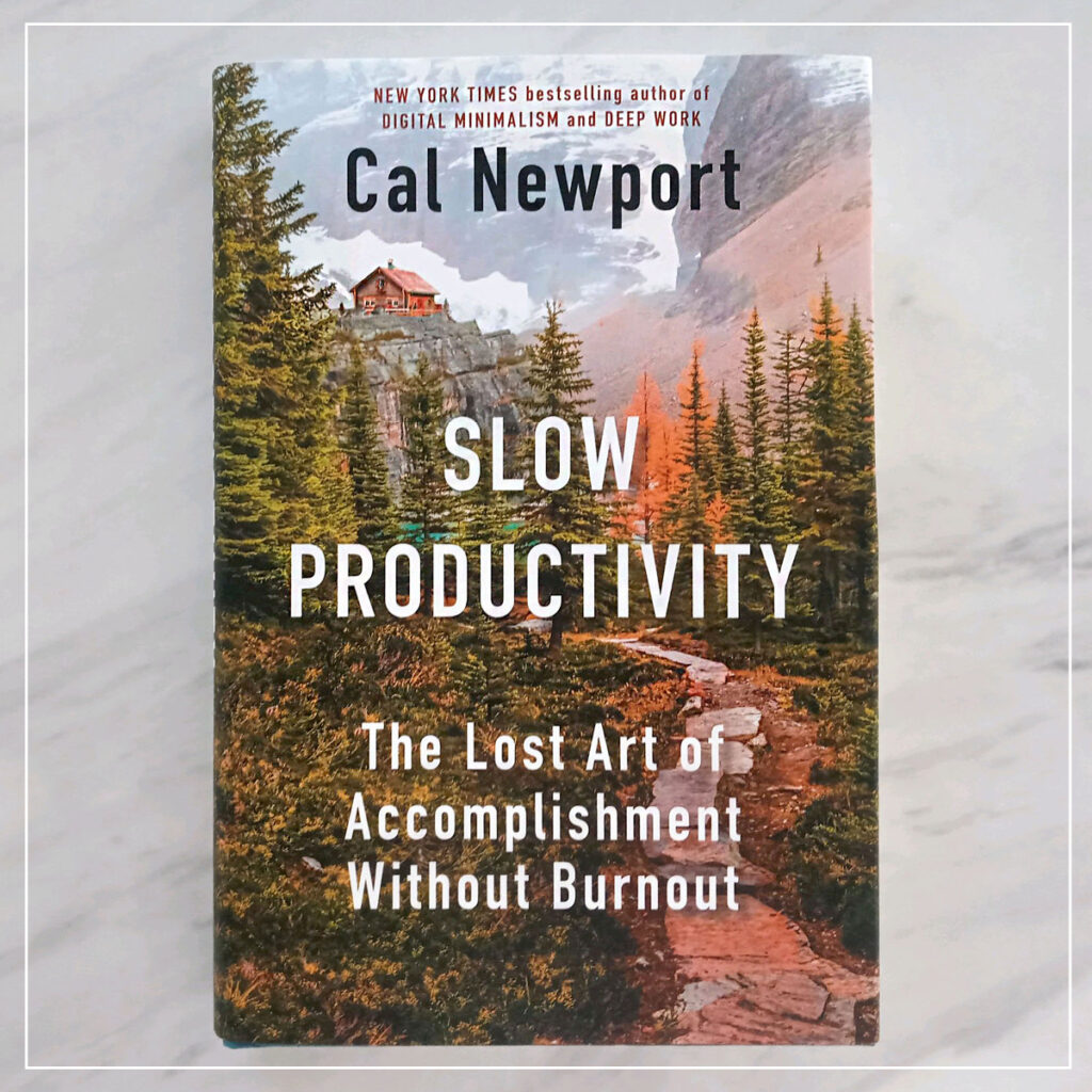 Cover of Slow Productivity by Cal Newport on marble countertop