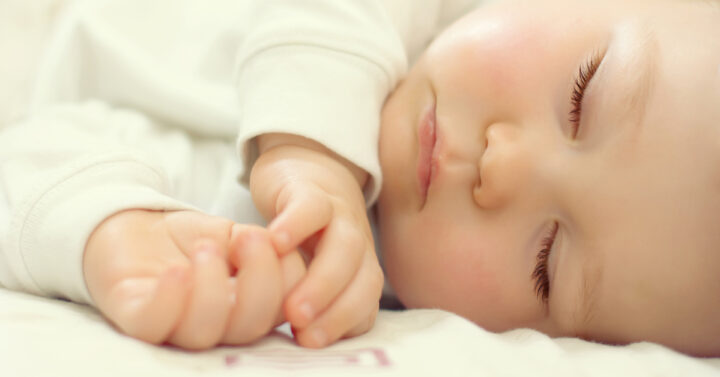 White baby peacefully sleeping