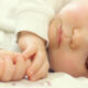 White baby peacefully sleeping