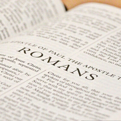 Bible open to the book of Romans