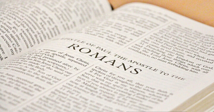 Bible open to the book of Romans